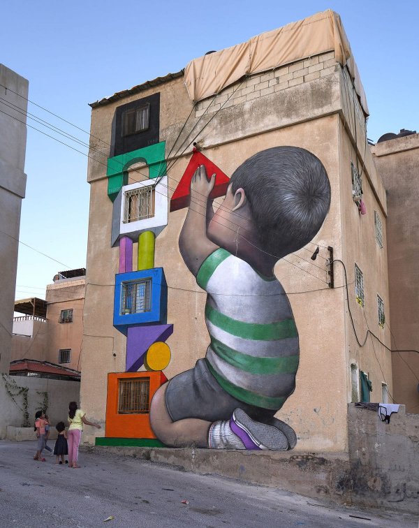 Художник-путешественник из Парижа и его добрые граффити в разных городах мира (18 фото)