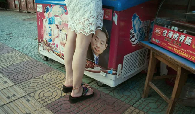 Уличные фотографии от китайского фотографа Тао Лю (25 фото)