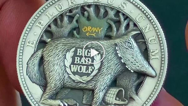 Mechanical coin with wolf and red riding hood